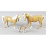 A collection of Beswick horses, foals and donkeys. (26)