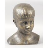 An art deco style bronze head and shoulder bust.