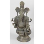 A cast metal Ganesh figure.