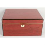 An unusual red stained wooden Cuban humidor.