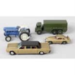 A collection of fifteen unboxed die cast model vehicles to include Corgi and Dinky examples. (15)