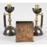 A pair of late 19th century candlesticks and a Newlyn copper box.