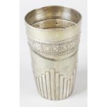 A Victorian silver beaker, together with a mid-20th century silver napkin ring. (2)