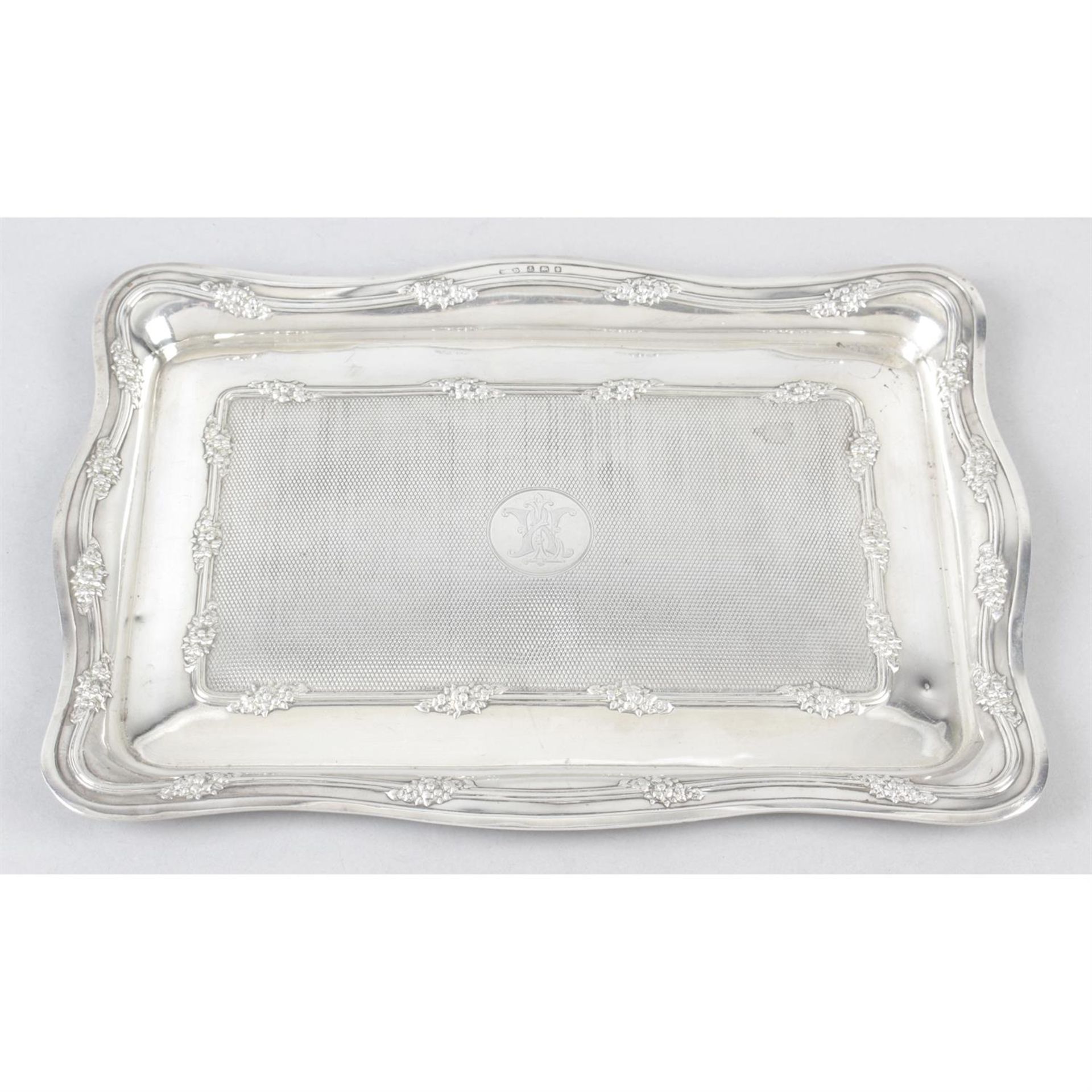 An Edwardian silver dressing table tray.