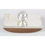 A modern silver mounted desk blotter.