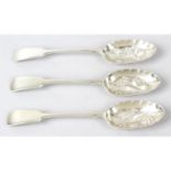 A set of three late Victorian silver Fiddle pattern 'berry' spoons.