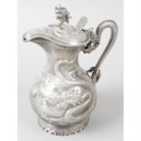 A Chinese export silver lidded jug.