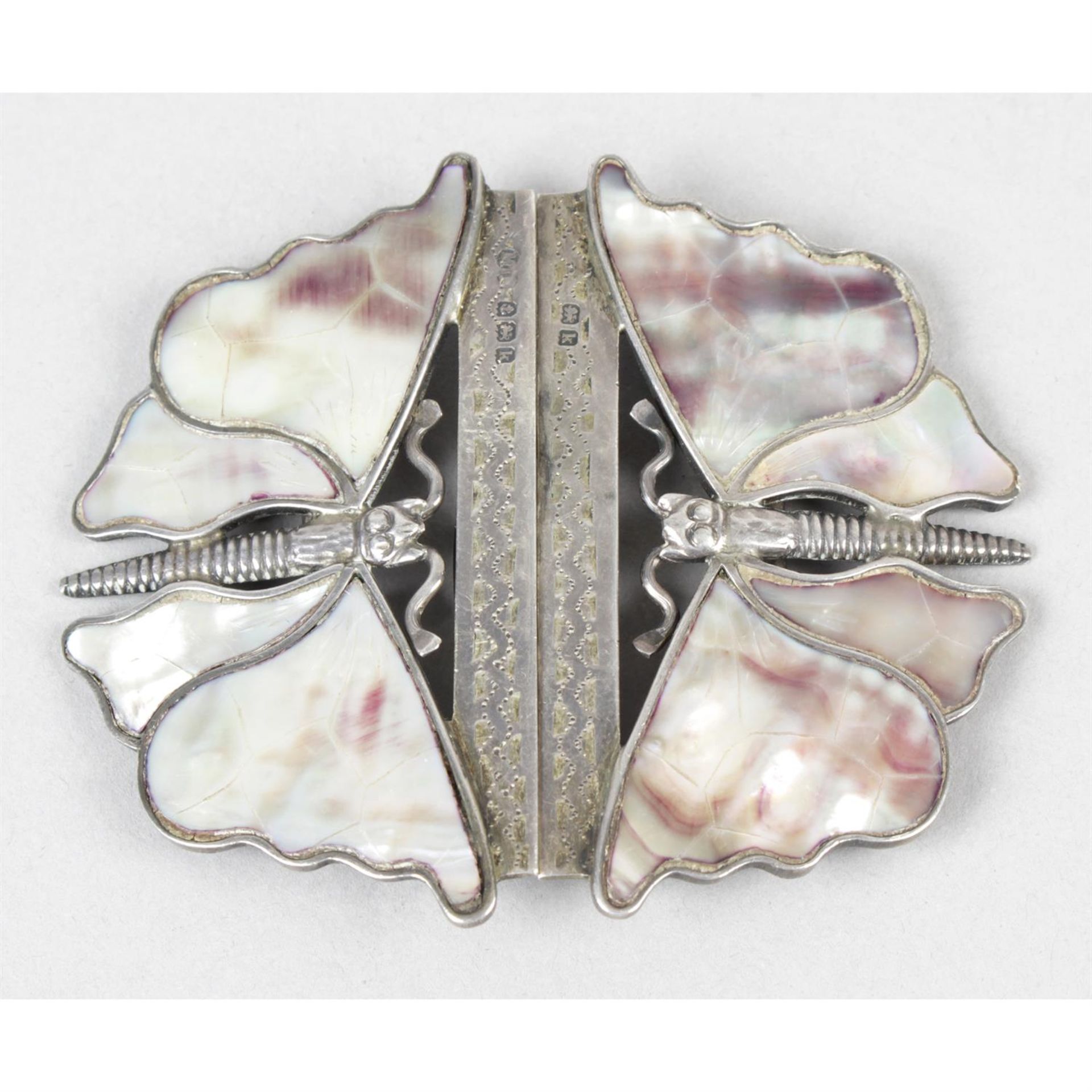 An Edwardian silver and mother-of-pearl buckle.