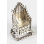 A turn of the century silver novelty miniature of the Coronation Chair.