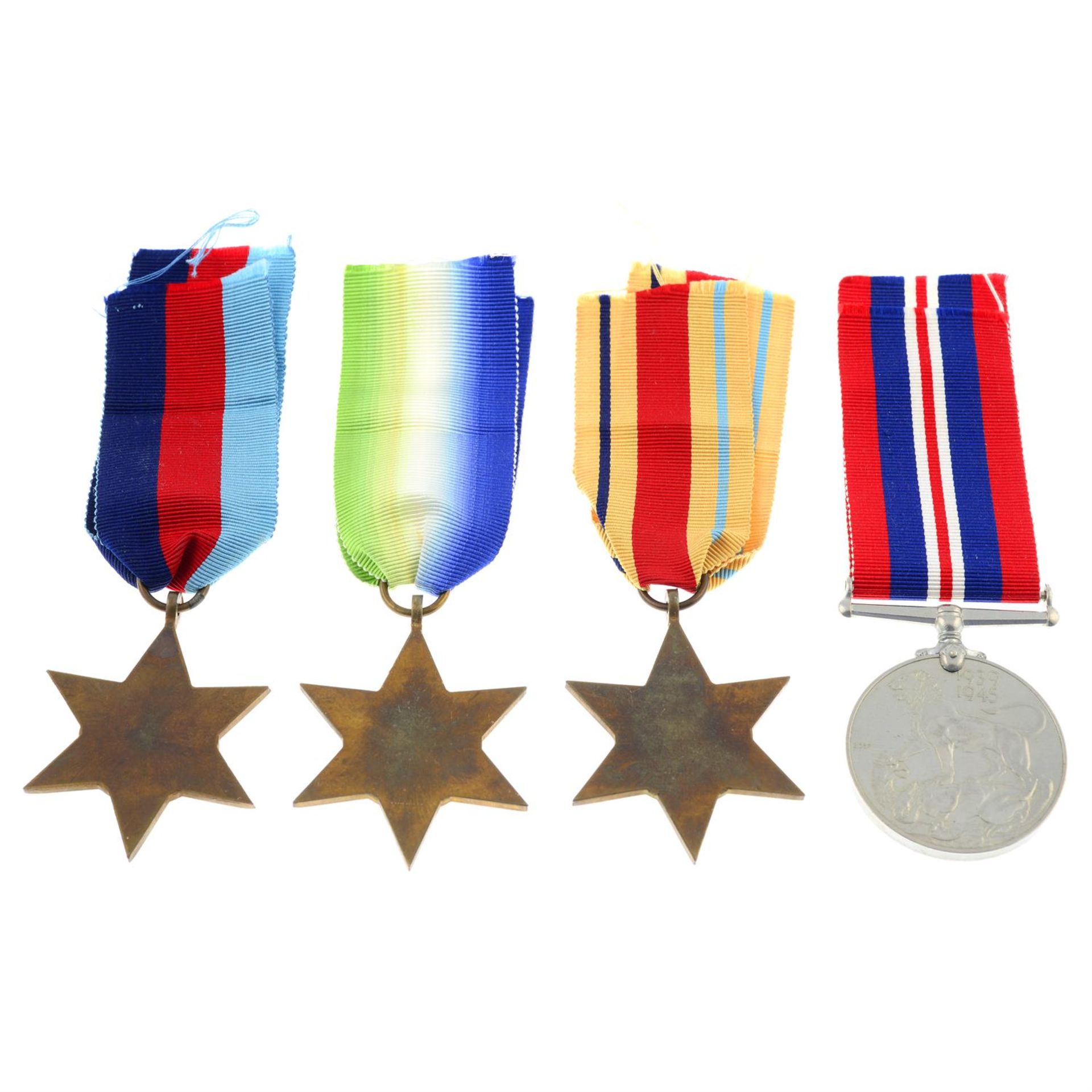 A group of four WWII medals with personal papers; together with another group of four with postage - Image 2 of 5