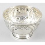 A late Victorian embossed silver footed bowl.