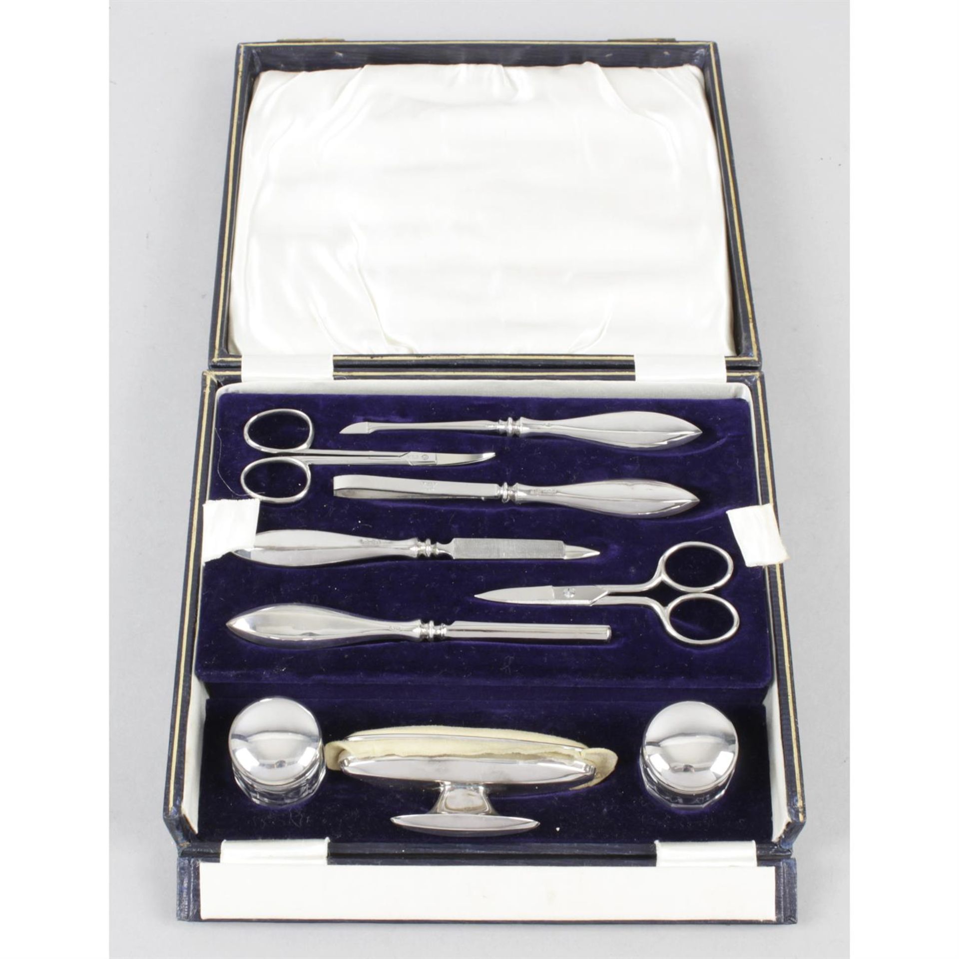 A 1930's silver and guilloché enamel part dressing table set, together with a cased - Image 3 of 4