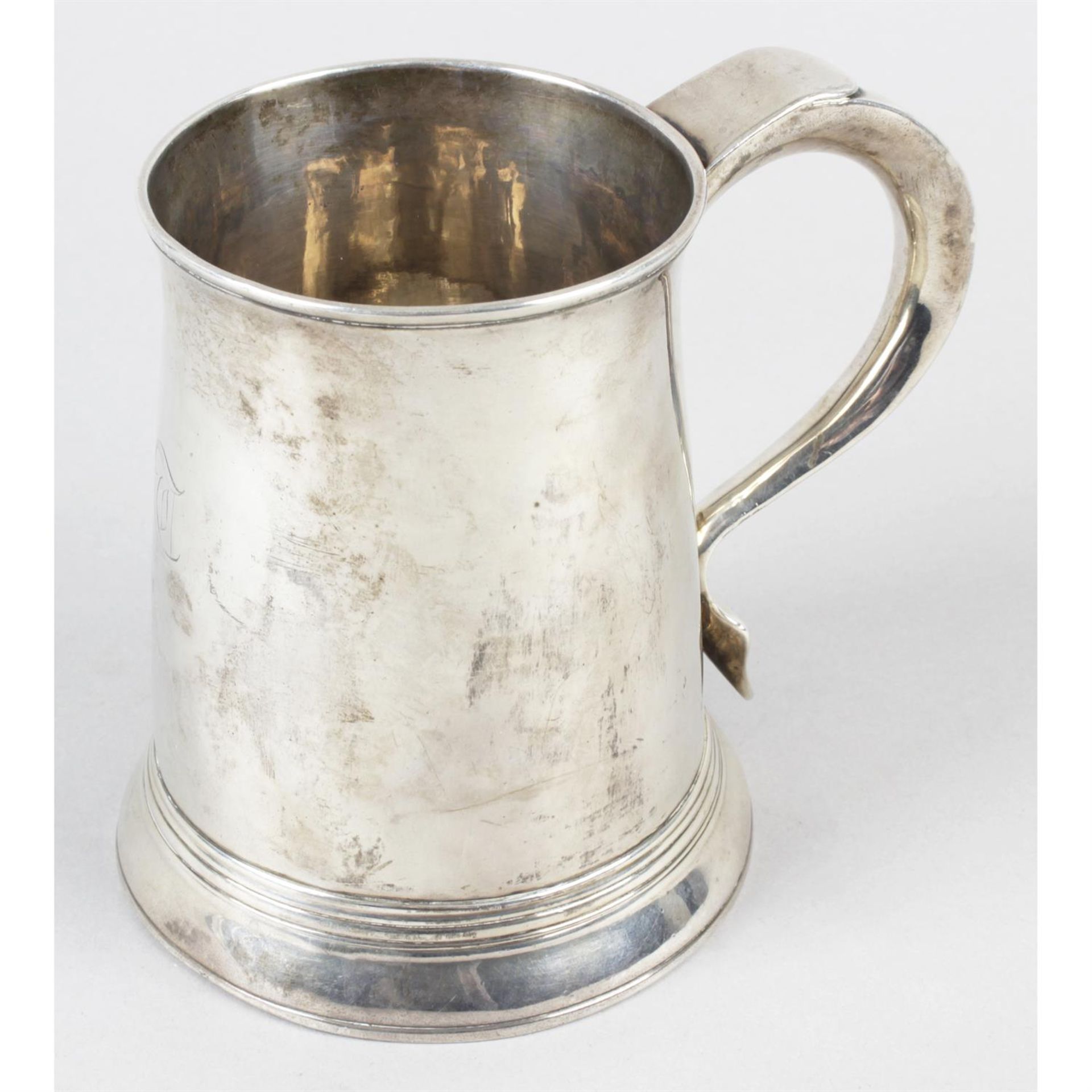 A George III silver mug.