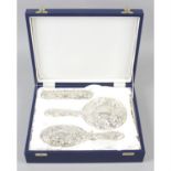 A modern silver mounted dressing table set, in fitted case.