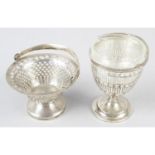 An Edwardian silver swing-handled and pierced pedestal sugar basket, together with a George V