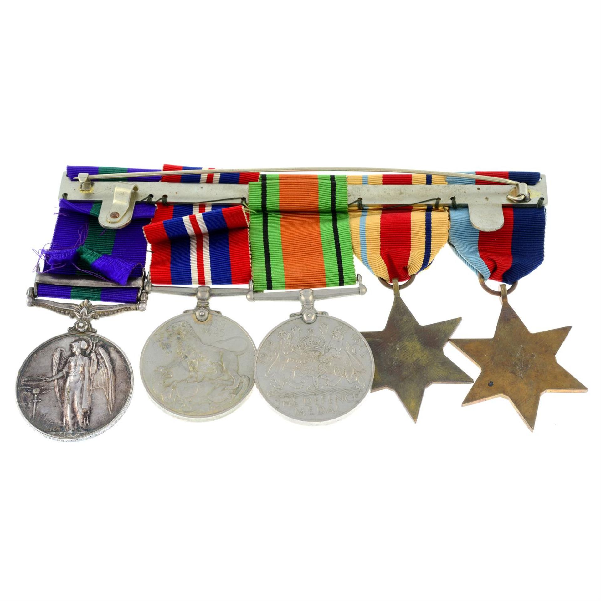 A group of four WWII medals, mounted together with a General Service Medal 1918-62. - Image 2 of 2