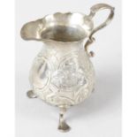 A George II silver cream jug by David Hennell I.