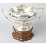 An Edwardian silver Art Nouveau style twin-handled trophy, by Walker & Hall.