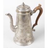 A George II silver coffee pot.