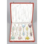 A cased set of six Danish silver-gilt and guilloché enamel spoons.