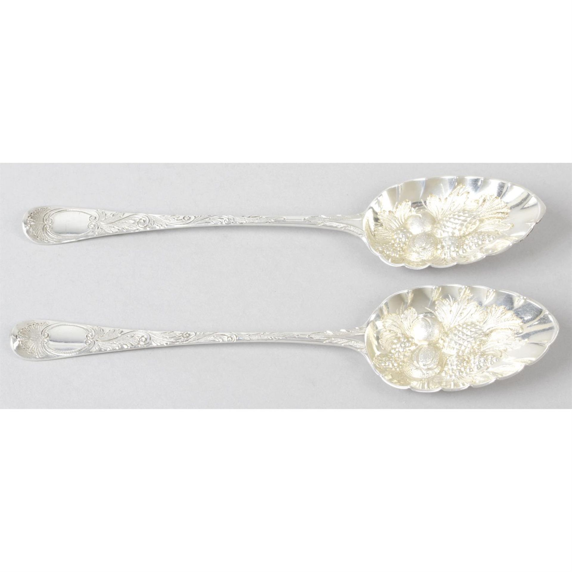 A pair of George III silver 'berry' spoons.