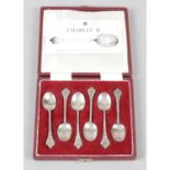 A modern cased set of six silver reproduction 'Trifid' coffee spoons, together with a set of six