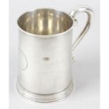 A mid-Victorian silver mug of tapered cylindrical form.