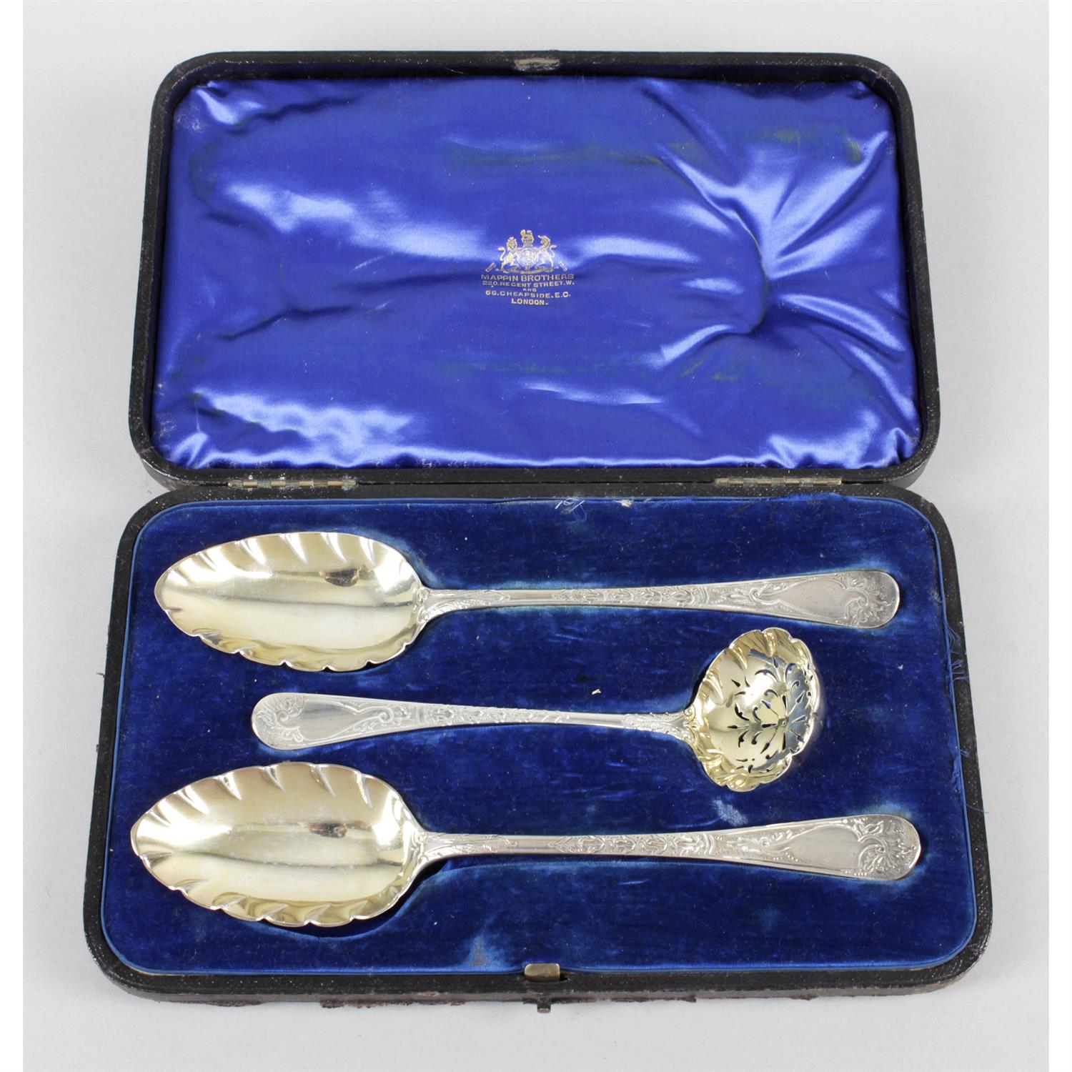 A cased George III silver matched fruit serving spoon set.