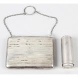 A George V silver mounted case or aide-memoire, together with a modern silver coin holder. (2)