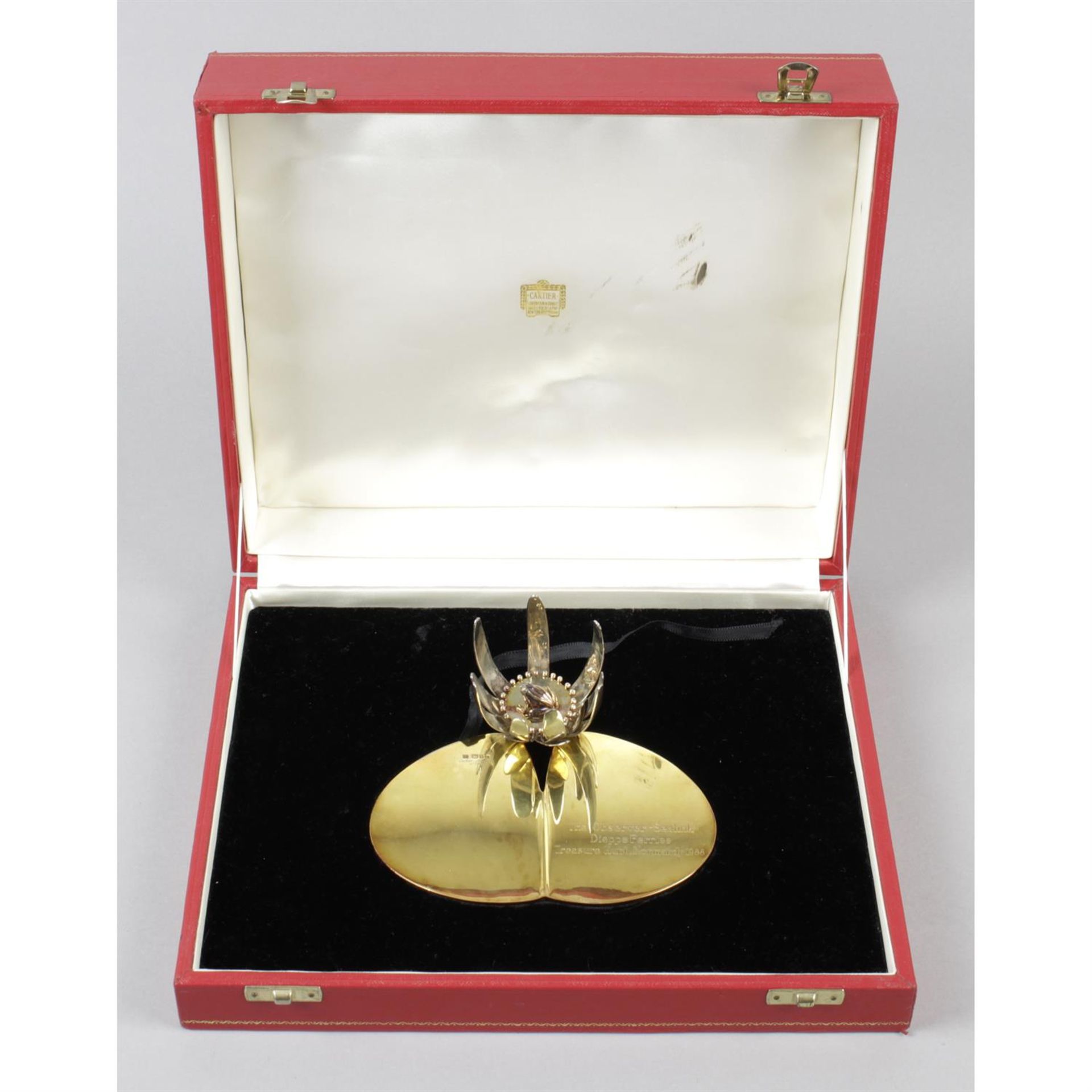 An unusual cased Cartier frog and lily pad ornament.