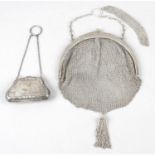 A small early 20th century silver mounted purse, together with a mesh bag, marked 800. (2).