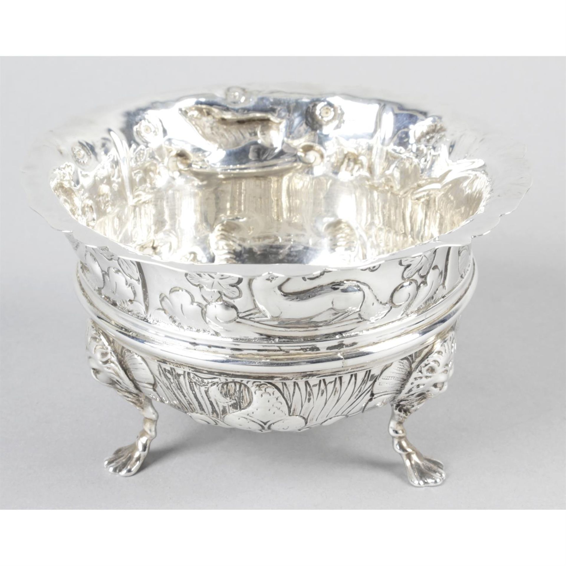 A small Edwardian silver embossed bowl.