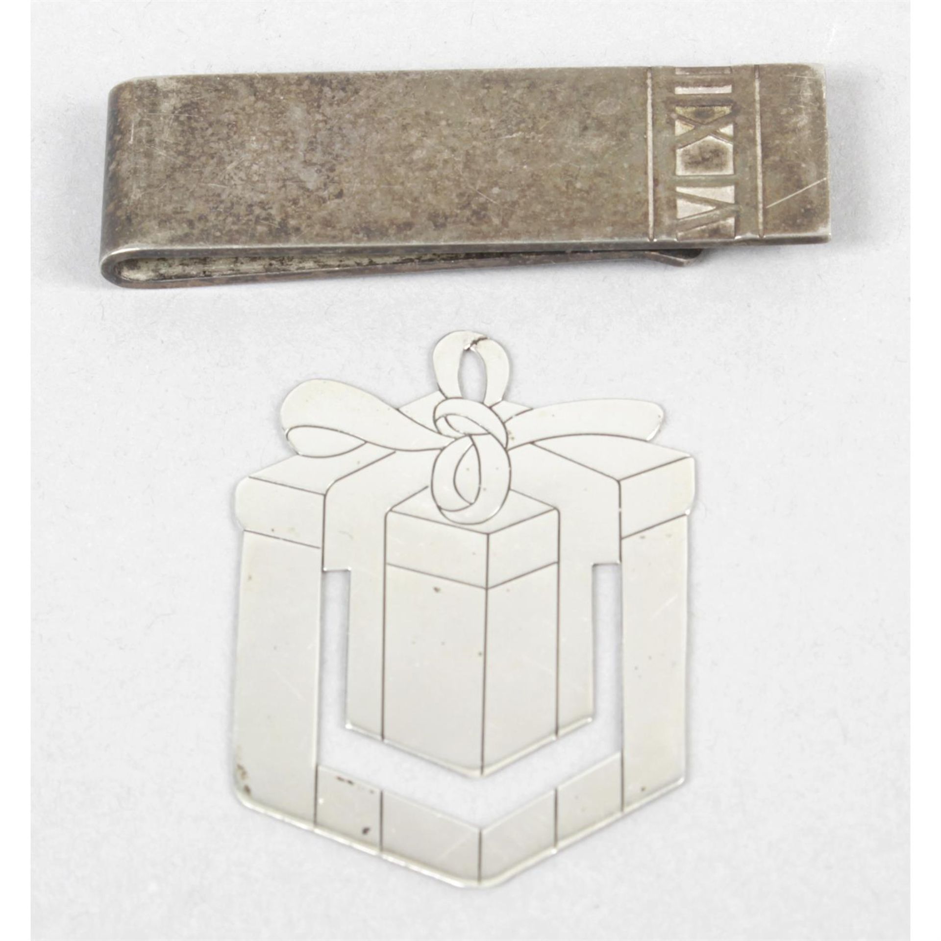 Tiffany & Co, a sterling silver bookmark and a money clip. (2).