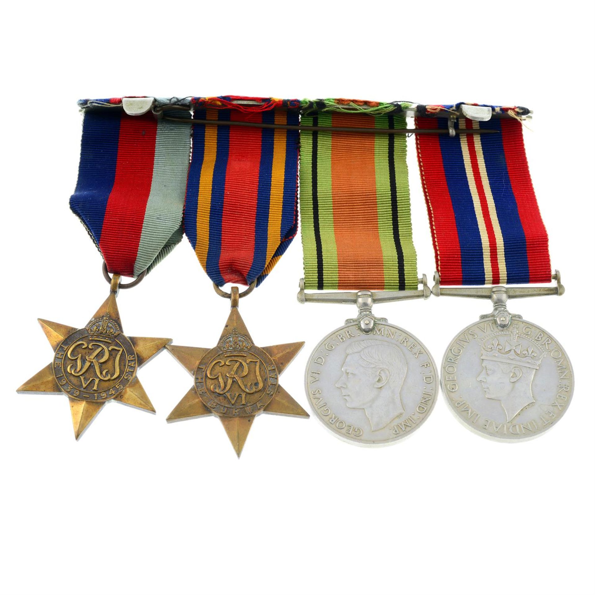 A WWII group of four medals, plus a selection of ephemera, etc.