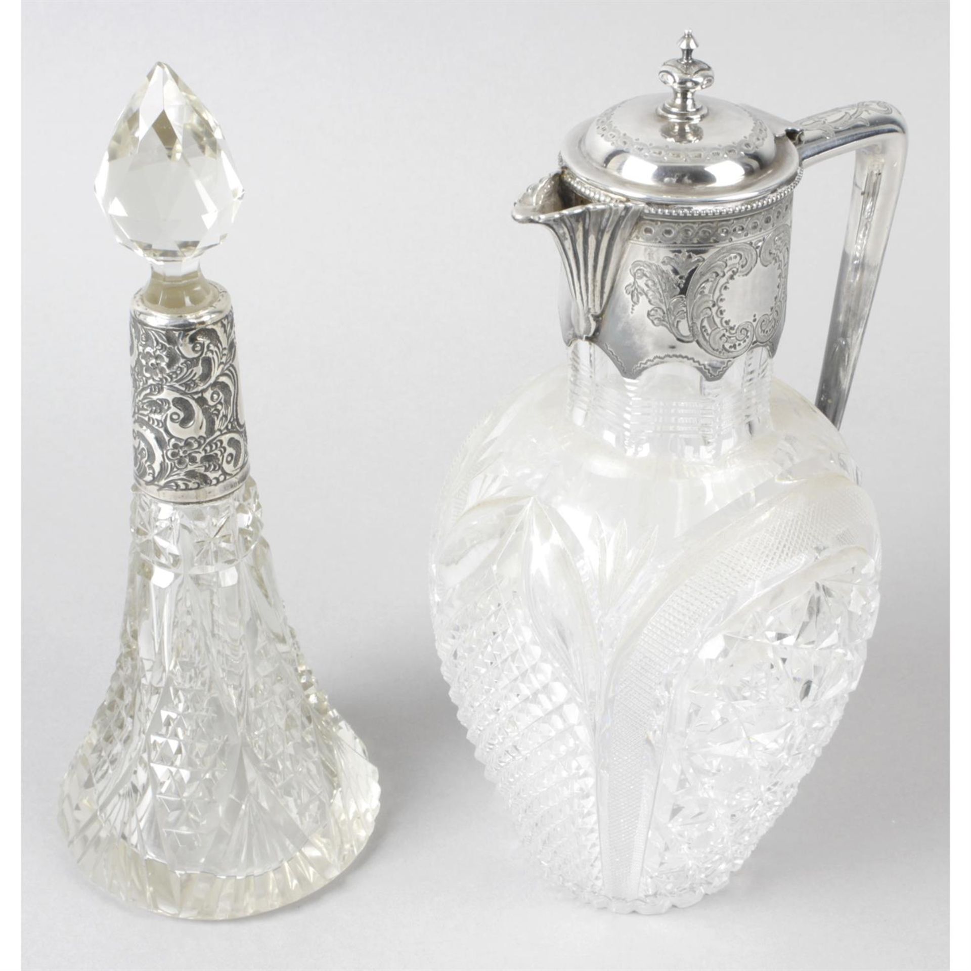A late Victorian silver mounted glass claret jug, together with a small silver mounted glass