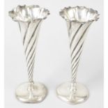 A pair of late Victorian silver trumpet vases.