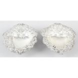 A pair of late Victorian silver pierced and embossed dishes.