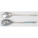Four decorative spoons to include three Russian examples. (4).