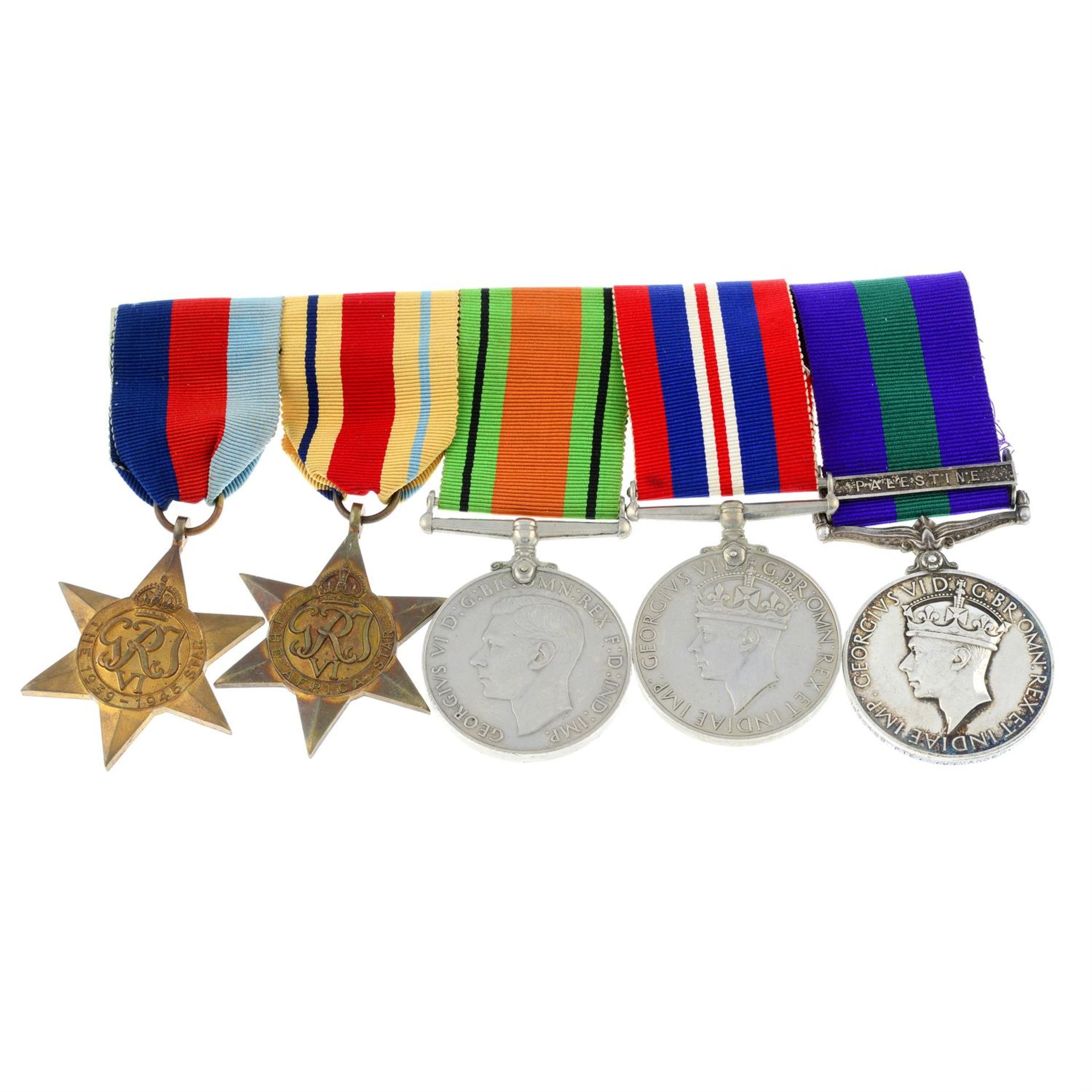 A group of four WWII medals, mounted together with a General Service Medal 1918-62.