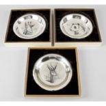 Three limited edition Bernard Buffet silver collector's plates.