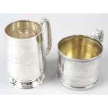 A 1920's silver christening mug, plus an American sterling silver example, and an Edwardian silver