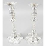 A pair of modern silver candlesticks, in Georgian style.