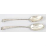 A pair of George III silver basting spoons, in Old English pattern.
