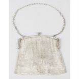 A 1920's silver mounted mesh bag, together with a mesh drawstring bag. (2).