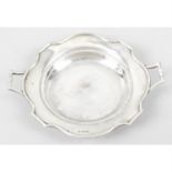 A George V silver twin-handled dish.