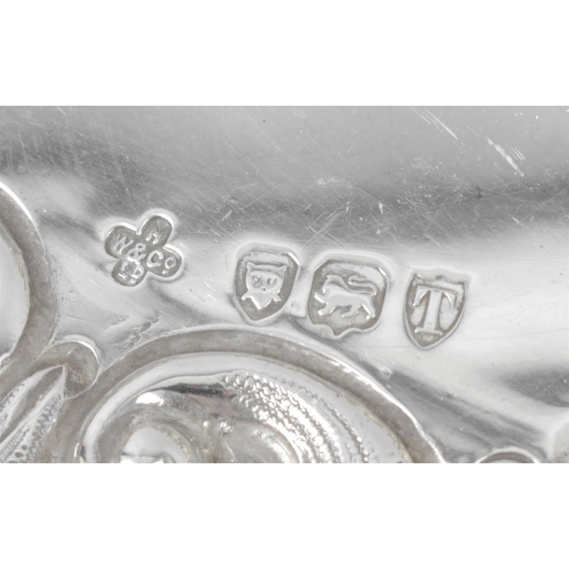 A late Victorian silver pierced and embossed dish. - Image 2 of 2