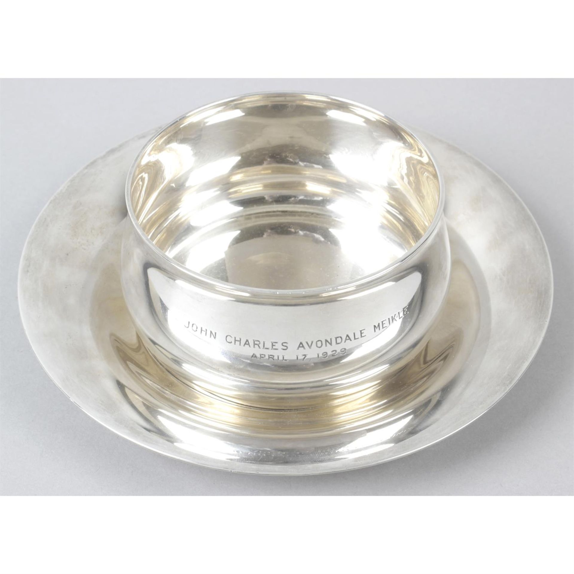 A Tiffany & Co sterling silver presentation bowl and dish.