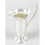 An Edwardian silver cream jug.
