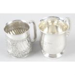 A late Victorian silver christening mug and a 1930's silver christening mug, together with a small