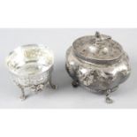 An Edwardian silver small caddy, together with a small silver import bowl on three legs. (2).